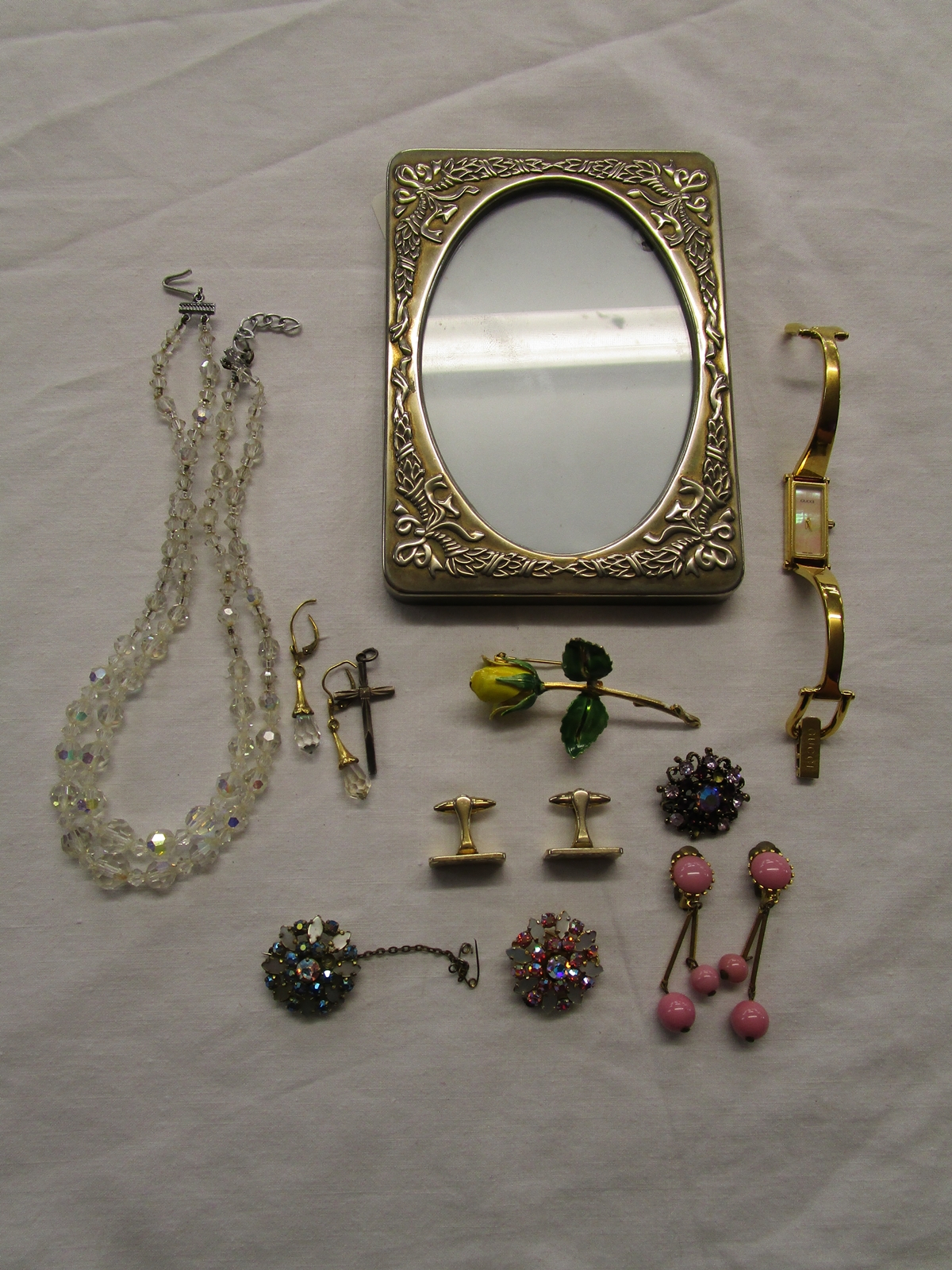 Small box of costume jewellery, ladies Gucci watch & white metal picture frame