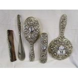 Ornate silver 5 piece brush set