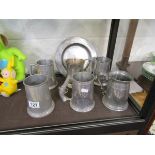 Collection of pewter tankards and plate