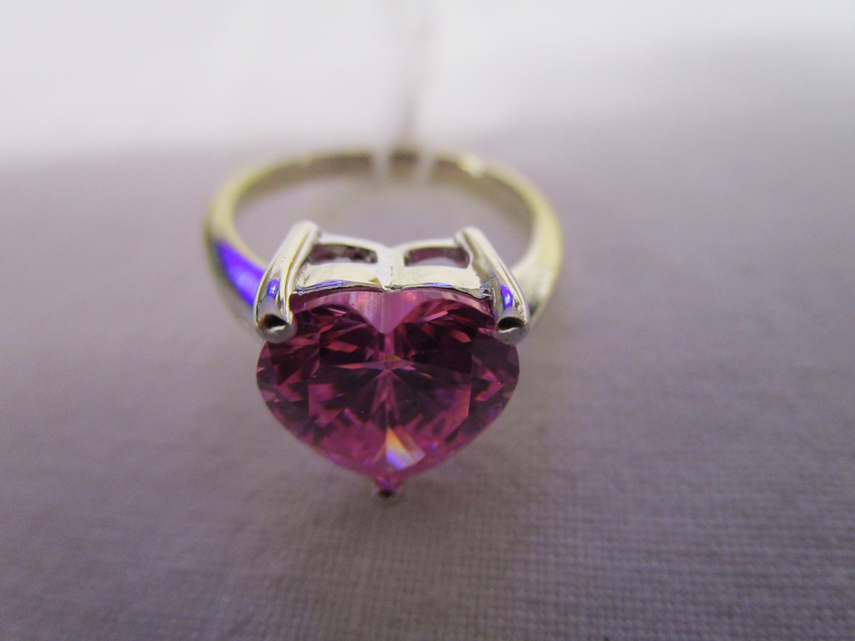 White gold heart shaped pink topaz solitaire ring