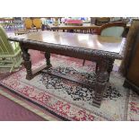 Small carved oak refectory table with Greenman carvings