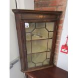 Inlaid glass fronted corner cupboard