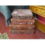 4 vintage leather suitcases
