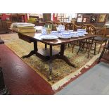 Mahogany pedestal dining table with brass feet