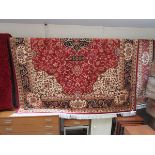 Red ground Ziegler rug (approx 1.9m x 1.4m)