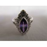 Fine 18ct marquee shaped amethyst and diamond ring