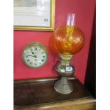 Ship's wall clock and oil lamp