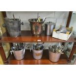 Flatware and 5 champagne buckets over 2 shelves
