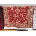 Red ground Keshan carpet (approx 2.8m x 2m)