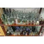 2 shelves of early glass bottles etc