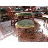 Edwardian mahogany tub chair on casters