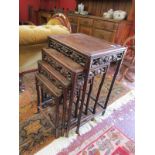 Nest of 4 Chinese carved ornate tables