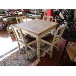 Oak and painted barley-twist draw-leaf table and 4 chairs