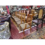 Set of six slat back dinning chairs to include 2 carvers