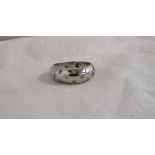 Unusual 18ct diamond set ring