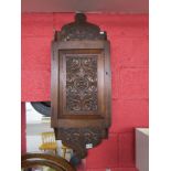 Carved oak wall cabinet