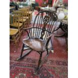 Good quality elm wheel-back rocking chair