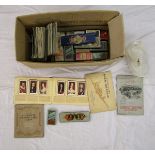 Box of cigarette cards etc in albums