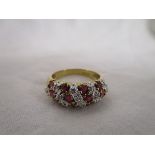 Gold ruby and diamond set ring