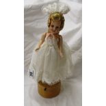 Vintage spinning music doll