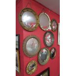 Collection of 8 mirrors, mostly convex
