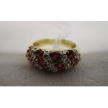 Gold ruby and diamond set ring