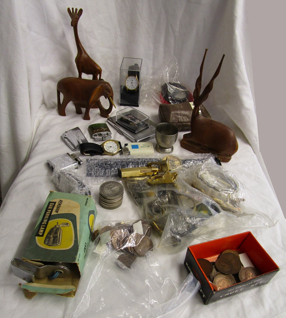 Box of collectables to include watches, coins & carved animals etc