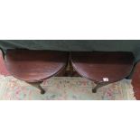 Pair of mahogany demi lune tables