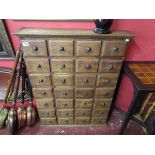 Hardwood bank of 28 drawers