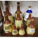 Collection of Bells Wade decanters to include 1 full