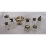 Collection of silver and silver topped bottles