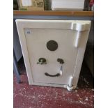 Antique fire-resistant safe with key