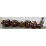 Collection of lidded stoneware pots