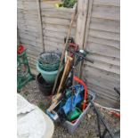 Collection of garden tools, hanging baskets etc