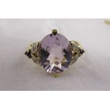 Gold faceted amethyst & diamond set ring