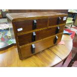 Small 2 over 2 chest of collectors drawers with Art Deco handles