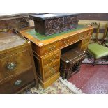 Leather top yew pedestal desk