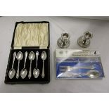 Pair of silver candlesticks, boxed set of silver spoons and boxed Arthur Price EPNS for children