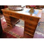 Leather top yew pedestal desk