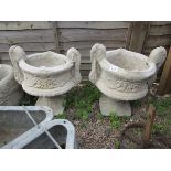 Pair of stone pedestal planters