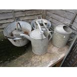 Collection of vintage galvanised watering cans & tubs