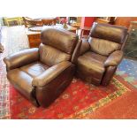 Pair of leather reclining armchairs