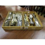 Collection of flatware in trays to include silver