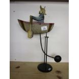 Reproduction swing toy - Man in rowing boat