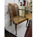 Cane seated & inlaid armchair