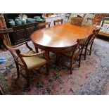 Regency style dining table with 2 leaves & 6 chairs to include 2 carvers