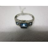 White gold, blue topaz & diamond set ring