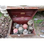 Tin trunk and contents of oil lamps