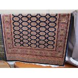 Blue ground Bokhara rug (1.9 x 1.4 metres)