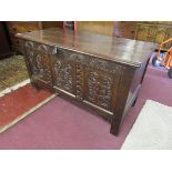 Oak coffer with candle box & carved front